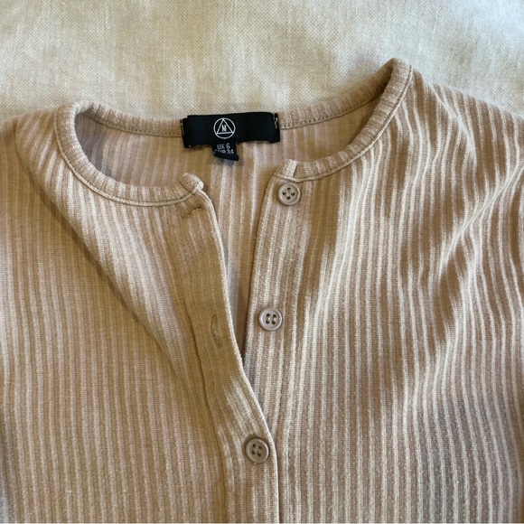 Cream/coral cozy bodysuit with buttons up the front - Picture 7 of 9